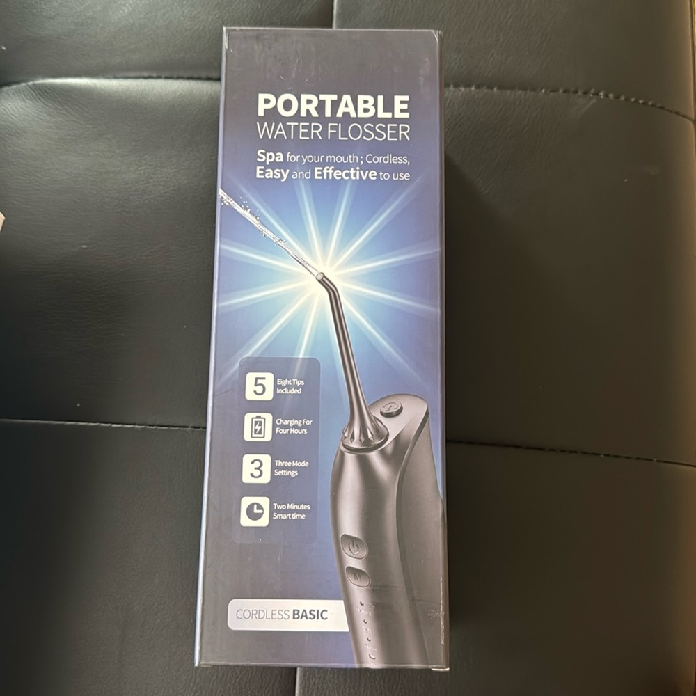 Portable Water Flosser ( Brand New )